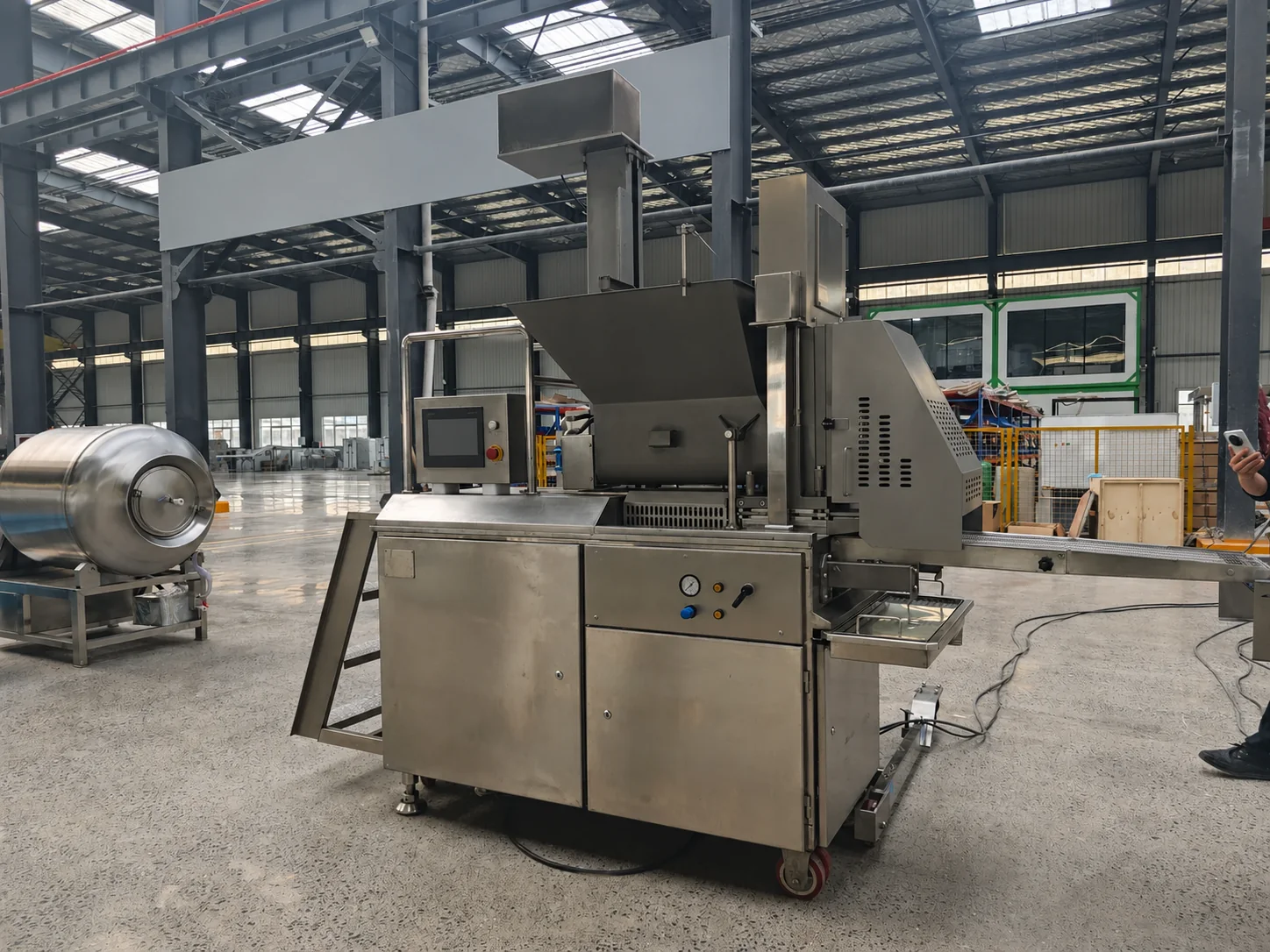 Food forming equipment photographed during workshop engineering review
